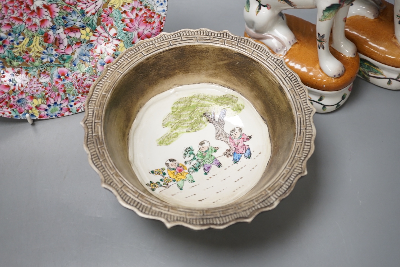 A Chinese porcelain bowl, brush pot, plate and a pair of dogs
